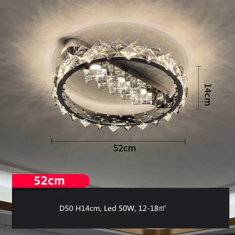 Maison Ornate stainless steel circular LED chandelier, 52cm x 14cm, with sparkling crystal accents.