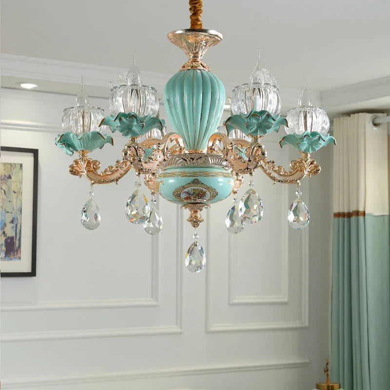 Maison Ornate crystal ceramic chandelier with gold, turquoise details, glass tulip shades, and crystal pendants.