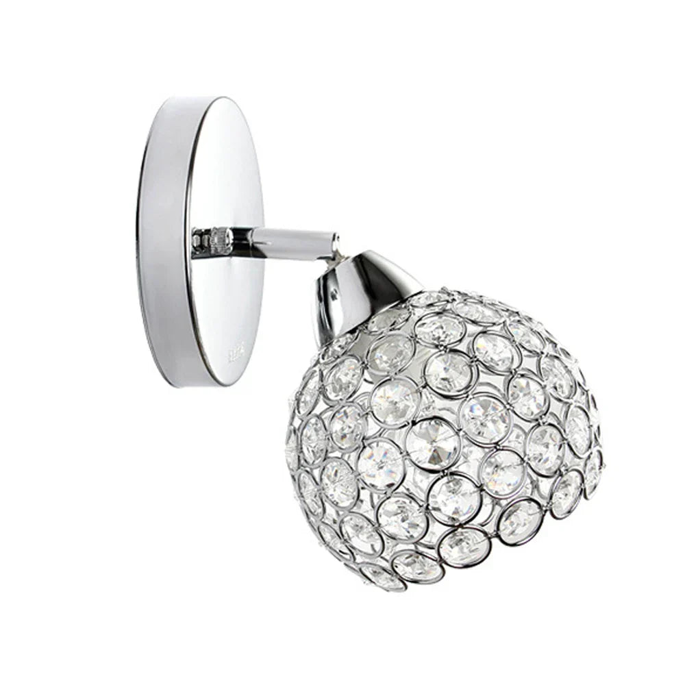 Round chrome chandelier with dome shade, clear crystal circles, and modern metal grid design.