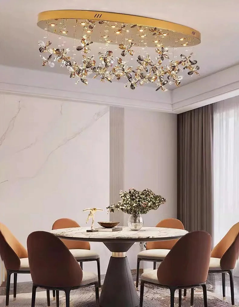 Maison Ornate Modern Crystal LED Pendant Light with cascading crystals, elegant gold accents, and sleek modern design.