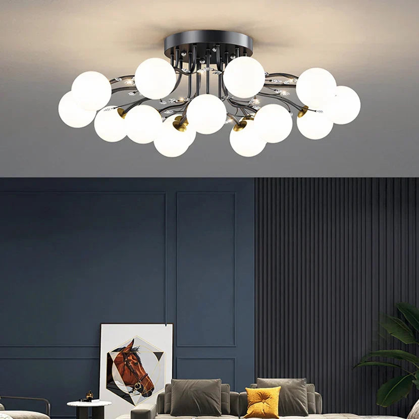 Maison Ornate Crystal Ball Chandelier features LED star bulbs and clear glass in a circular design.