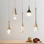 Five Maison Ornate Single Head Luxury Crystal Pendant Lights with gold-toned fixtures and glass bulbs.