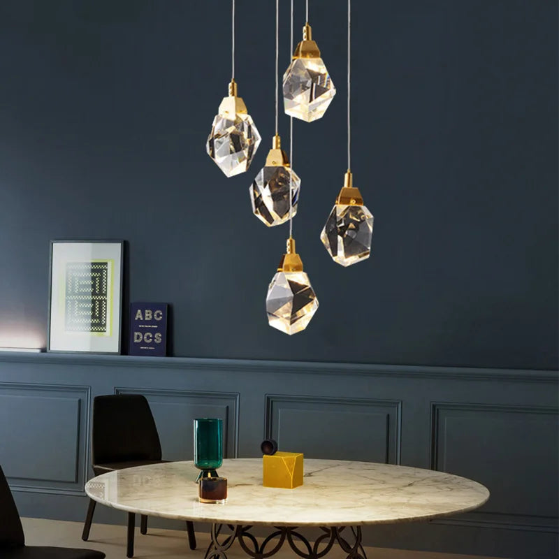 The Maison Ornate Elegant Crystal Chandelier features a modern design with intricate crystal detailing.
