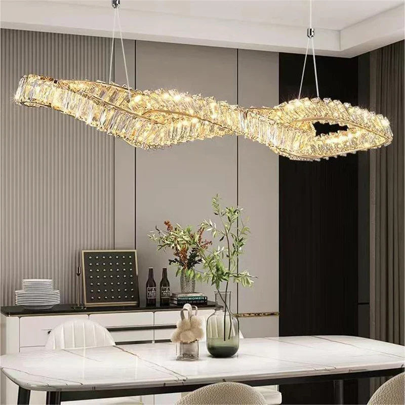 Maison Ornate Elegant Hanging Crystal Chandelier with Modern LEDs, sparkling crystals and sleek metal fixture.