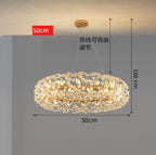 Modern K9 crystal chandelier with gold finish, integrated LED, 50 cm oval shape, adjustable cable.