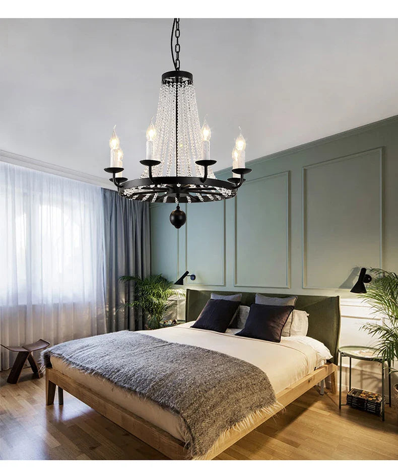 Maison Ornate’s Industrial Crystal Chandelier with iron frame and acrylic details, elegantly suspended.
