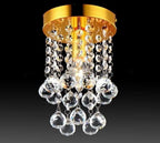 Maison Ornate Modern Crystal Pendant Light with tassels, featuring clear crystal beads and large pendants.