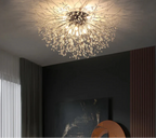 The Maison Ornate Elegant Crystal Branch LED Chandelier with intricate crystal design and soft LED lighting.