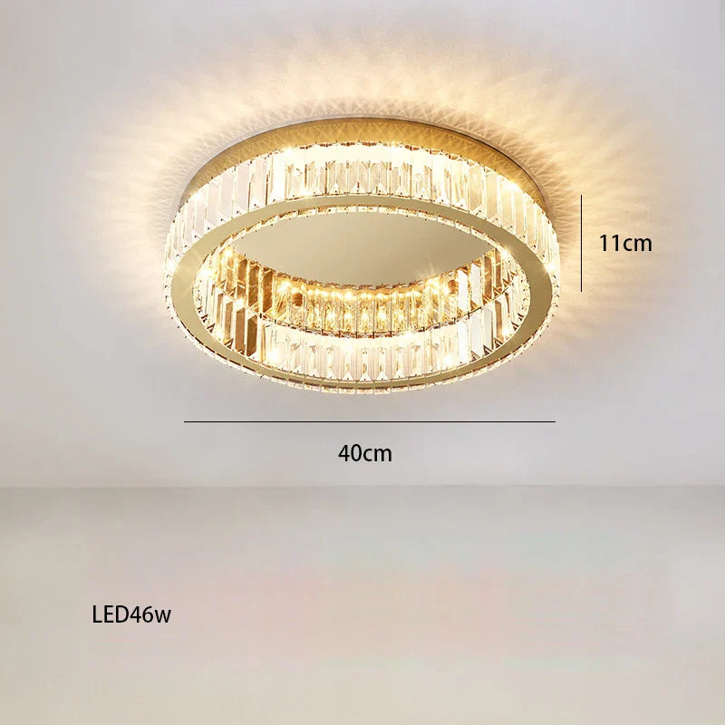Maison Ornate 40 cm round LED crystal chandelier, sleek design, warm dimmable light, 46W technology.