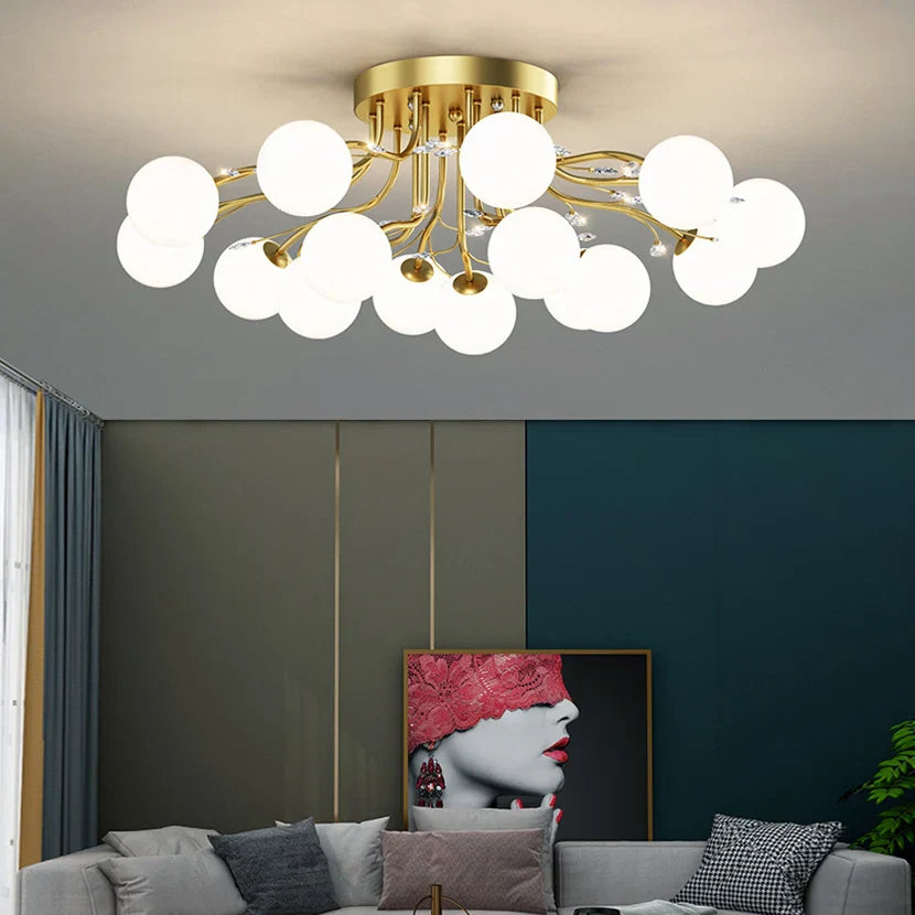 Maison Ornate Crystal Ball Chandelier with LED Stars and Clear Glass, elegantly suspended overhead.