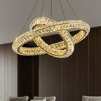 Modern spiral crystal chandelier with two interlocking rings and dimmable LED lighting on slim wires.