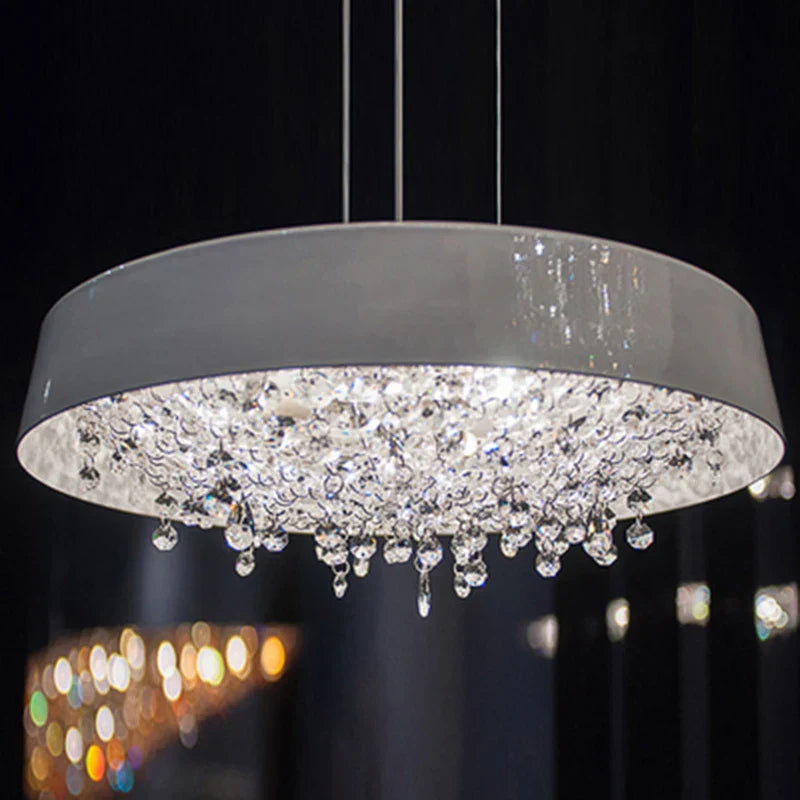 Crystal Chandelier by Maison Ornate: modern white circular frame, crystal droplets, integrated LED lighting.