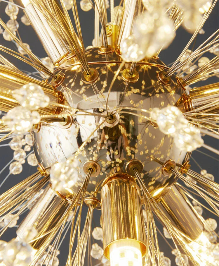 Maison Ornate Modern LED chandelier with gold base and acrylic rods tipped with crystal accents.