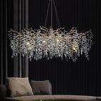 Maison Ornate Modern Crystal Chandelier with chrome branches and cascading crystal leaf accents. LED G9 compatible.