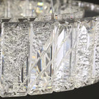 Close-up of Ornate Crystal Glass Pendant chandelier with textured, smooth vertical rectangular crystal panels.