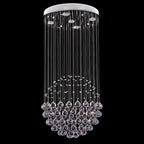 Modern spherical chandelier with polished steel, LED lights, and cascading clear faceted crystal spheres.