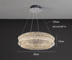Modern chandelier with two crystal rings, stainless steel cords, 60cm wide, 16cm high.