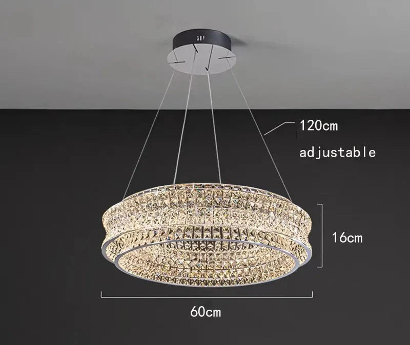 Modern chandelier with two crystal rings, stainless steel cords, 60cm wide, 16cm high.