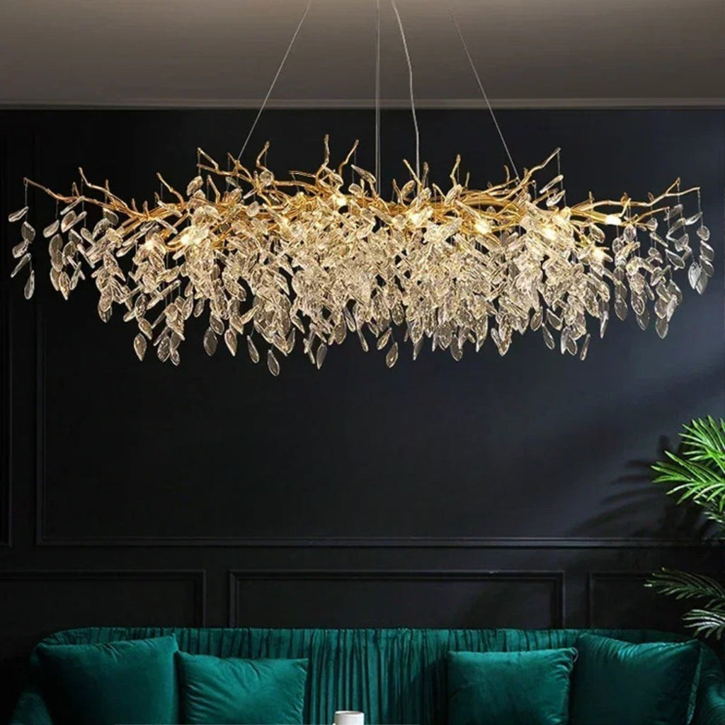 Modern Crystal LED Chandelier by Maison Ornate with polished aluminum frame and crystal leaf accents.