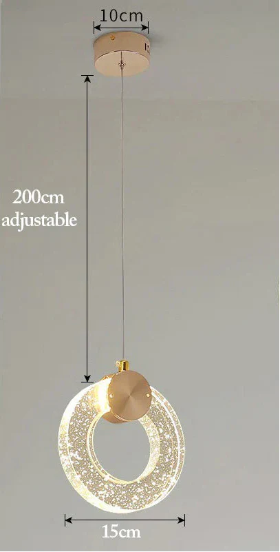 Gold-finished Nordic chandelier with circular LED ring, adjustable cable, and compact ceiling mount.