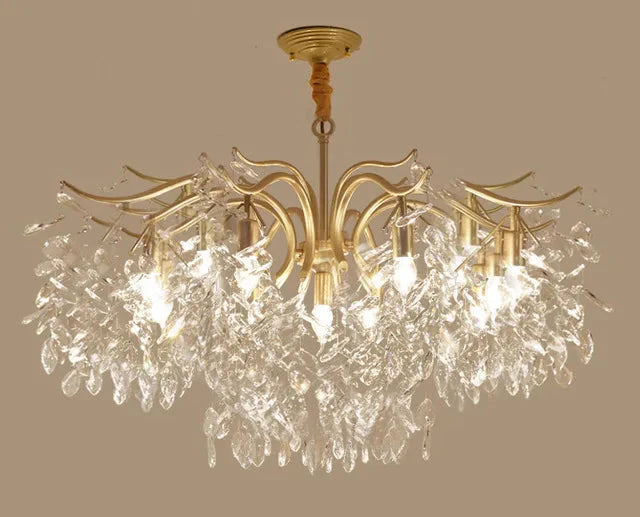 Gold-armed vintage crystal LED chandelier with sparkling crystals and bright bulbs for modern decor.
