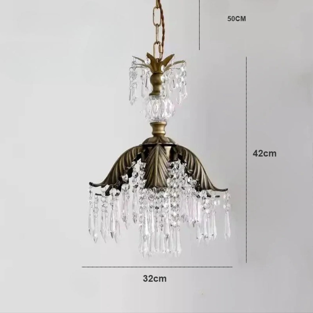 Ornate vintage crystal chandelier with pendants and chain, 50x42x32 cm, classic elegant design.