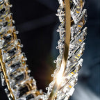 Close-up of Maison Ornate Modern LED Chandelier with geometric crystal accents reflecting light.