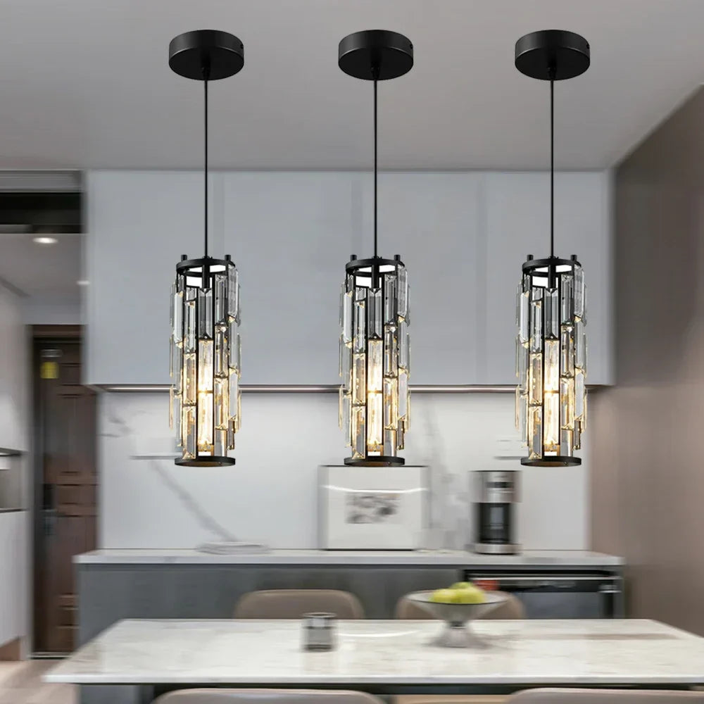 Three Maison Ornate Adjustable Modern Black Chrome Crystal Chandeliers with glass and metal details.