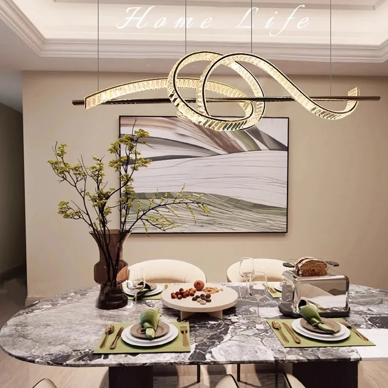 The Elegant Crystal Industrial Chandelier by Maison Ornate hangs with sleek, intricate detailing.