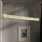 The Modern Crystal Chandelier by Maison Ornate features a sleek LED design and two slim suspension wires.