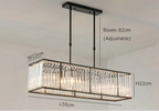 Modern rectangular LED crystal chandelier with black frame, crystal accents, and eight bulbs. Adjustable rods included.