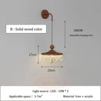 Ornate French medieval crystal teardrop chandelier with wood-toned frame, dangling crystals, adjustable suspension.