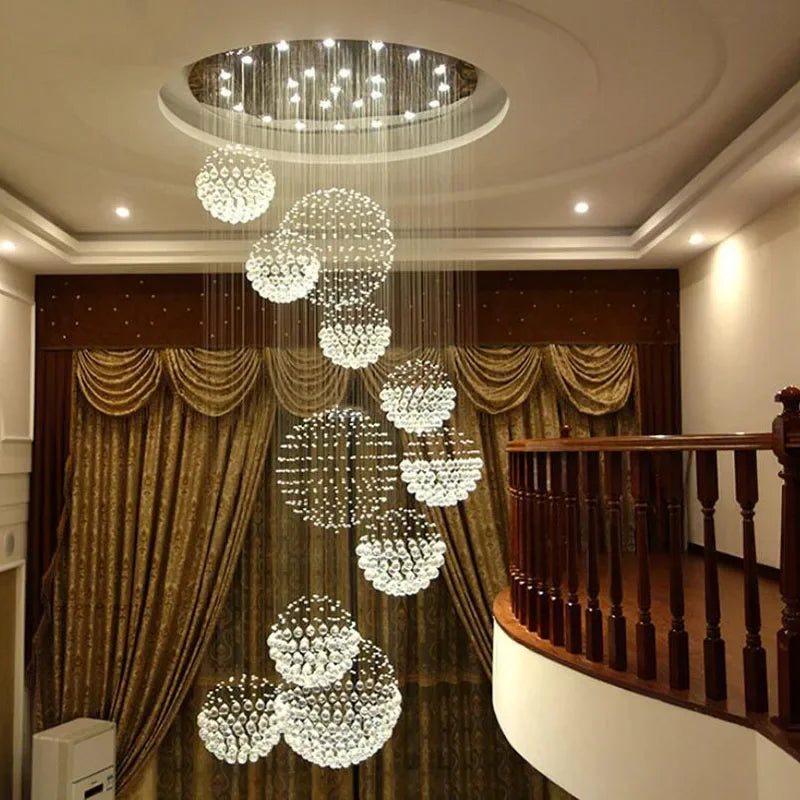 Maison Ornate Modern Crystal Pendant Light with stainless steel frame and cascading crystal spheres.