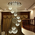 Maison Ornate Modern Crystal Pendant Light with stainless steel frame and cascading crystal spheres.