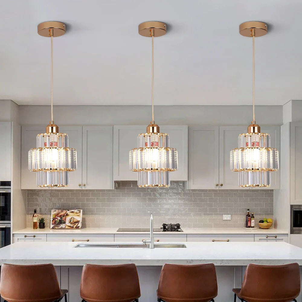 Three Maison Ornate Modern K9 Crystal LED chandeliers with elegant design and sparkling illumination.