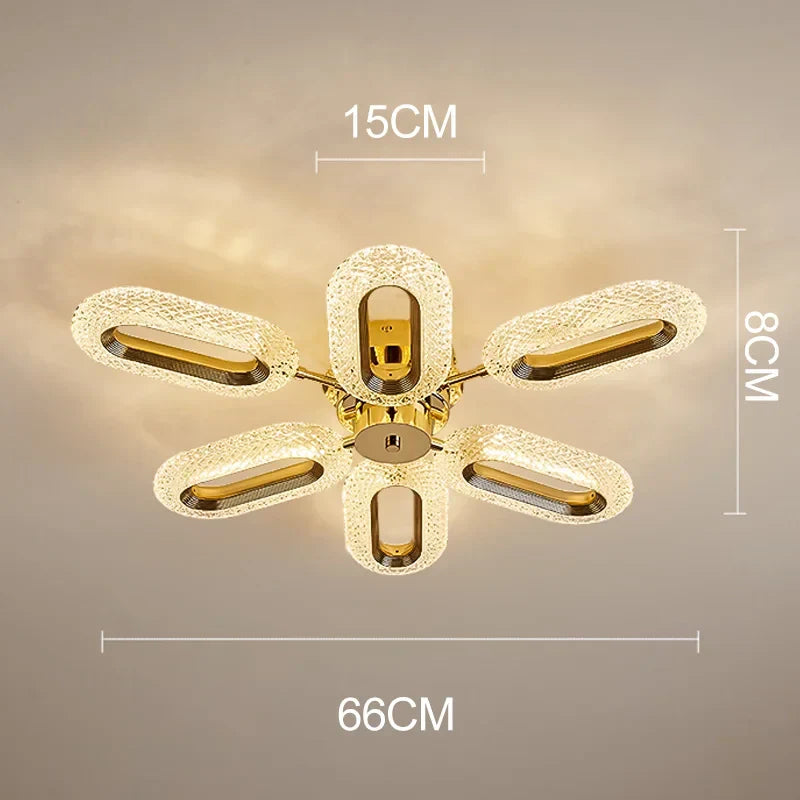 Post-modern LED chandelier with five oval, crystal-edged lights in a star pattern. 66 cm wide.