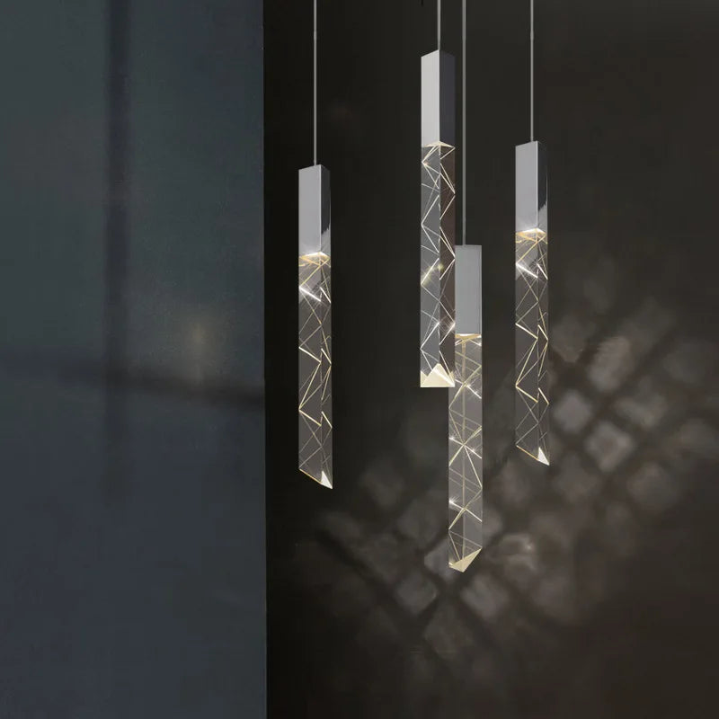 Four Maison Ornate Modern Crystal Chandeliers with chrome frames and crystal pendants, uniquely suspended.