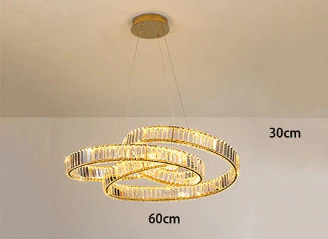 Nordic minimalist chandelier with two interlocking LED crystal rings and sleek wire suspension, 60x30 cm.
