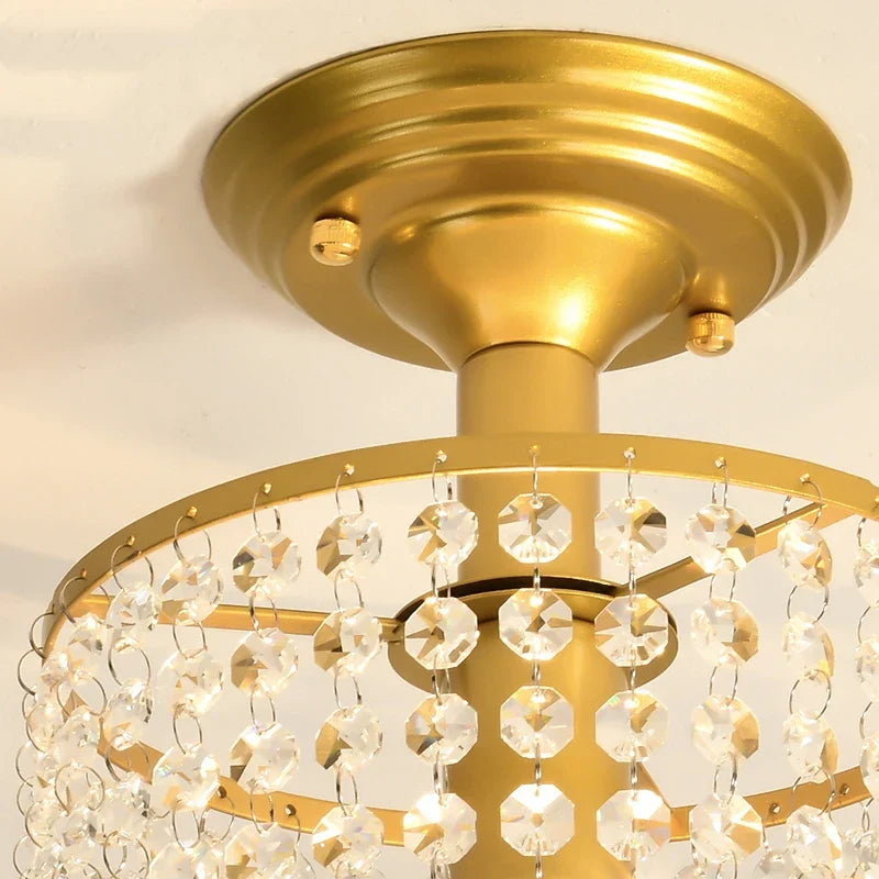 Close-up of Maison Ornate Modern Glass Gold Crystal LED Chandelier with elegant hanging crystal beads.