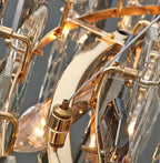 Maison Ornate Crystal LED chandelier with gold accents, faceted glass, exposed LEDs, and steel cables.