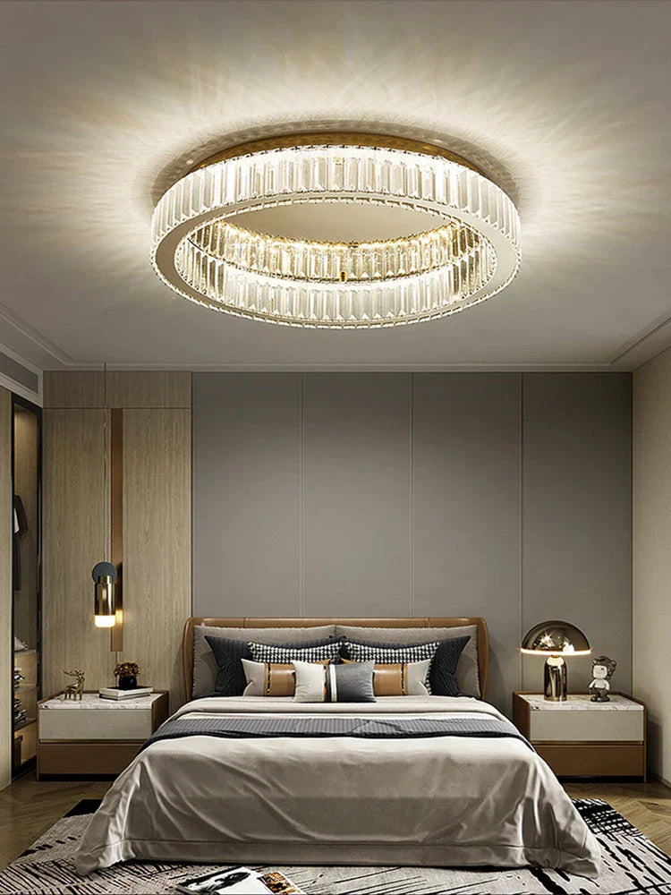 Maison Ornate’s Dimmable LED Crystal Glass Round chandelier with sparkling crystal accents on ceiling.