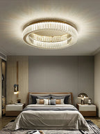 Maison Ornate’s Dimmable LED Crystal Glass Round chandelier with sparkling crystal accents on ceiling.