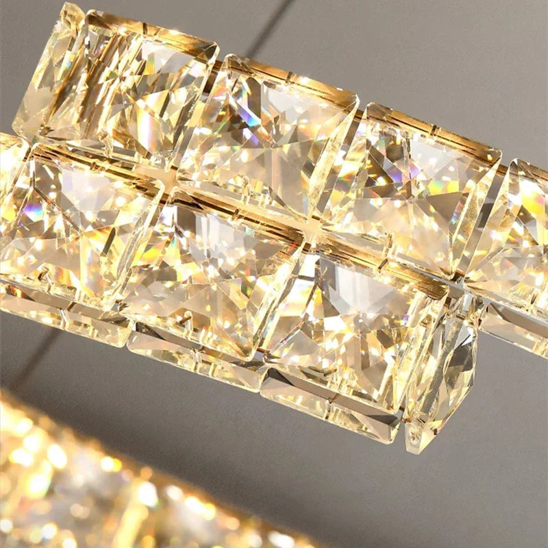 Maison Ornate's crystal chandelier with square faceted glass blocks and stainless steel LED lighting.