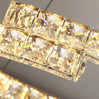 Maison Ornate's crystal chandelier with square faceted glass blocks and stainless steel LED lighting.