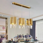 Three Maison ornate round gold industrial crystal chandeliers with LED, showcasing elegant, striking design.