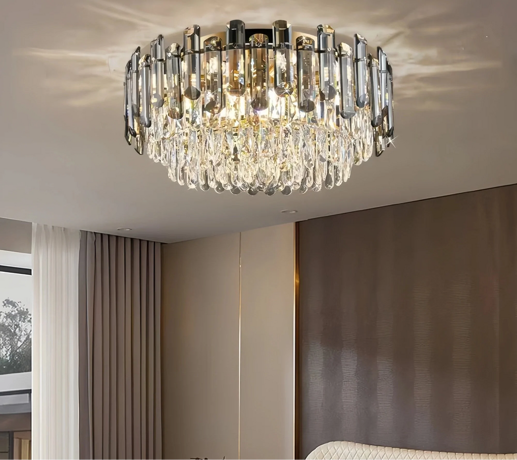 Elegant modern crystal chandelier with dimmable LED bulbs, layered glass pieces, and gold accents.