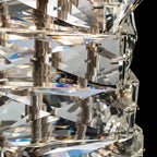 Close-up of Maison Ornate Modern LED Crystal Glass Chandelier, spiral faceted glass reflecting colorful geometric patterns.
