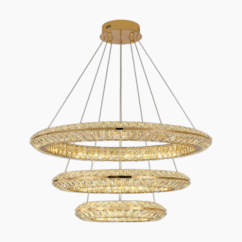 Three gold-ring chandelier with crystal accents, LED lighting, elegantly tiered and wire-suspended.