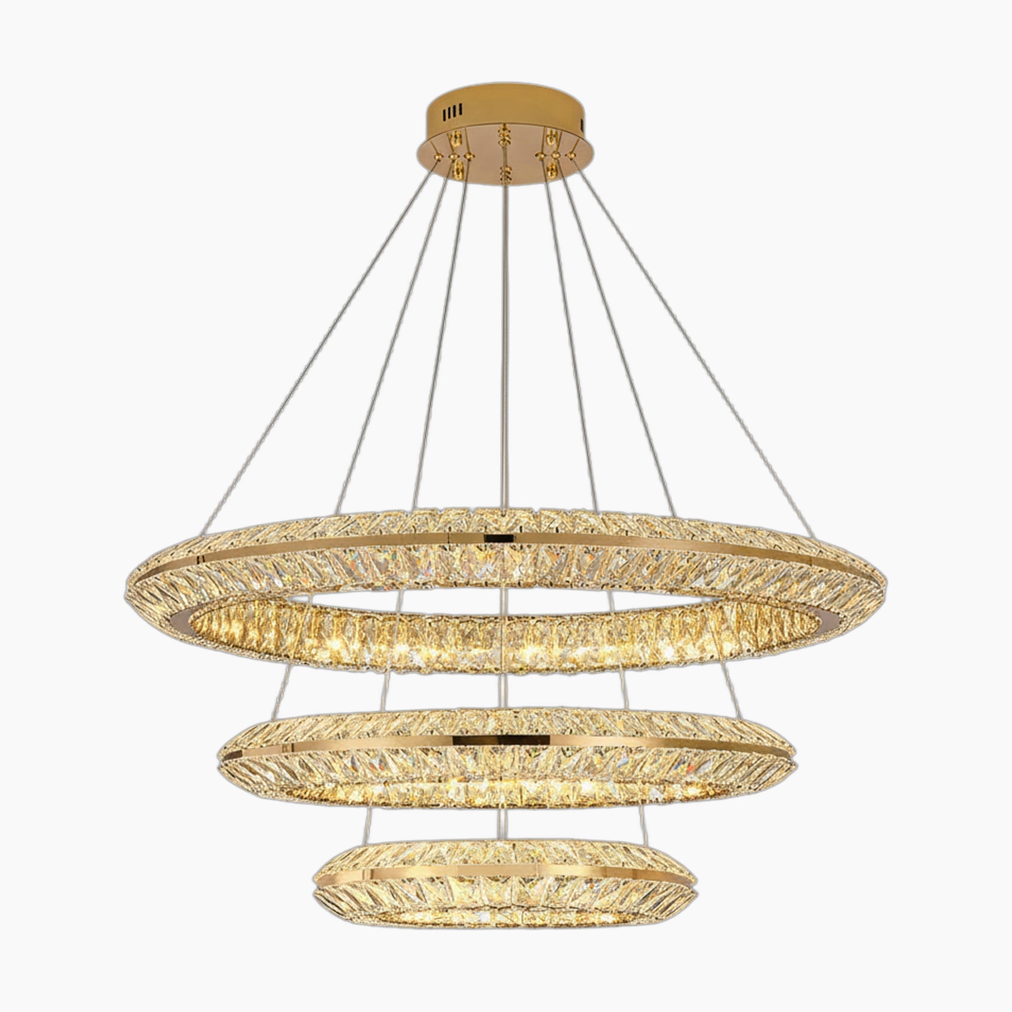 Three gold-ring chandelier with crystal accents, LED lighting, elegantly tiered and wire-suspended.