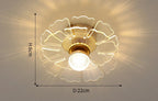 Modern crystal chandelier with flower-patterned translucent shade, gold floral accents, warm central bulb, 22 cm diameter.